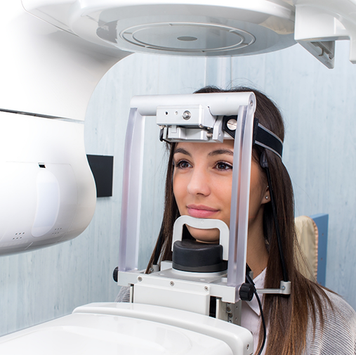 Woman about to have panoramic dental X rays taken