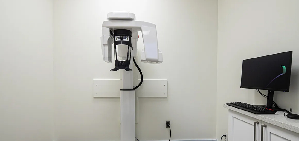 Scanning equipment against wall of dental office