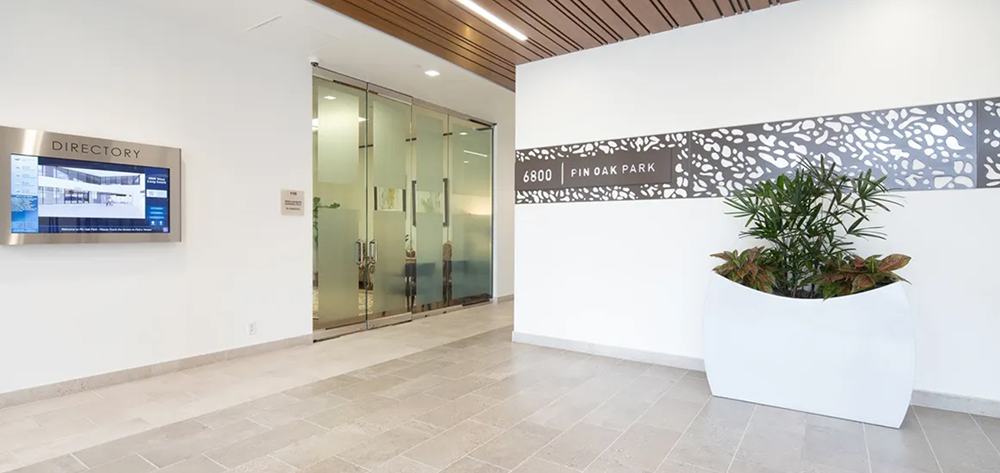 Foyer of office building with door in wall